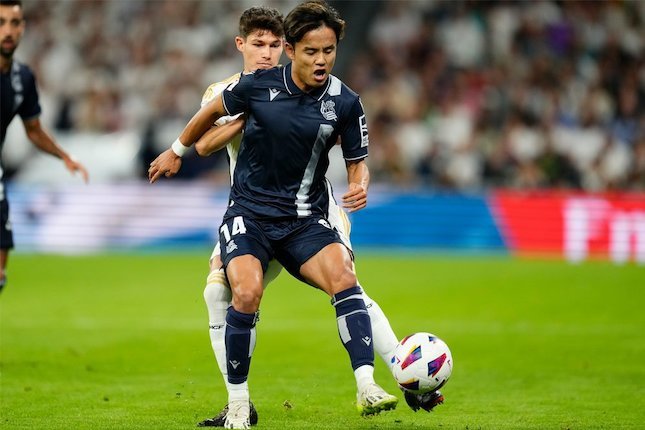 Aksi penyerang sayap Real Sociedad, Takefusa Kubo saat melawan Real Madrid pada pekan ke-5 Liga Spanyol 2023/2024, Senin (18/9/2023) WIB. (c) AP Photo/Jose Breton